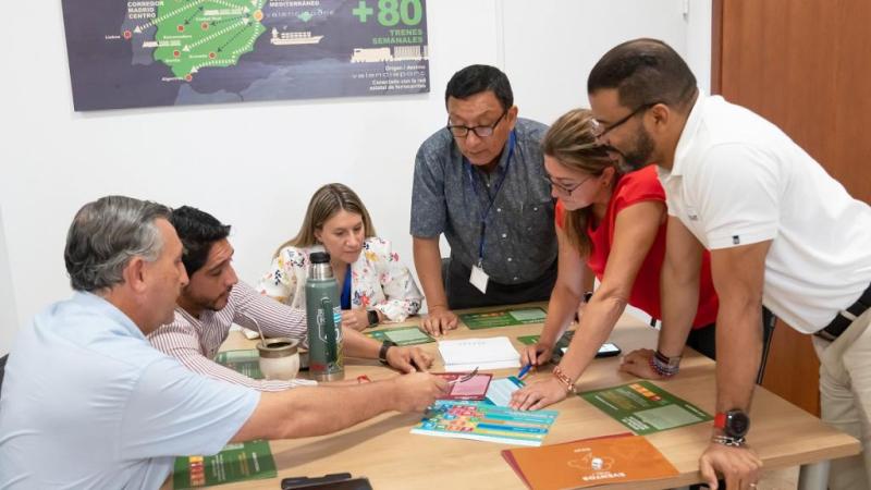 © Gonzalo Ayala/UNCTAD Photo | Juan Garcia (third right) in a board game designed to raise awareness about port sustainability during an UNCTAD training.