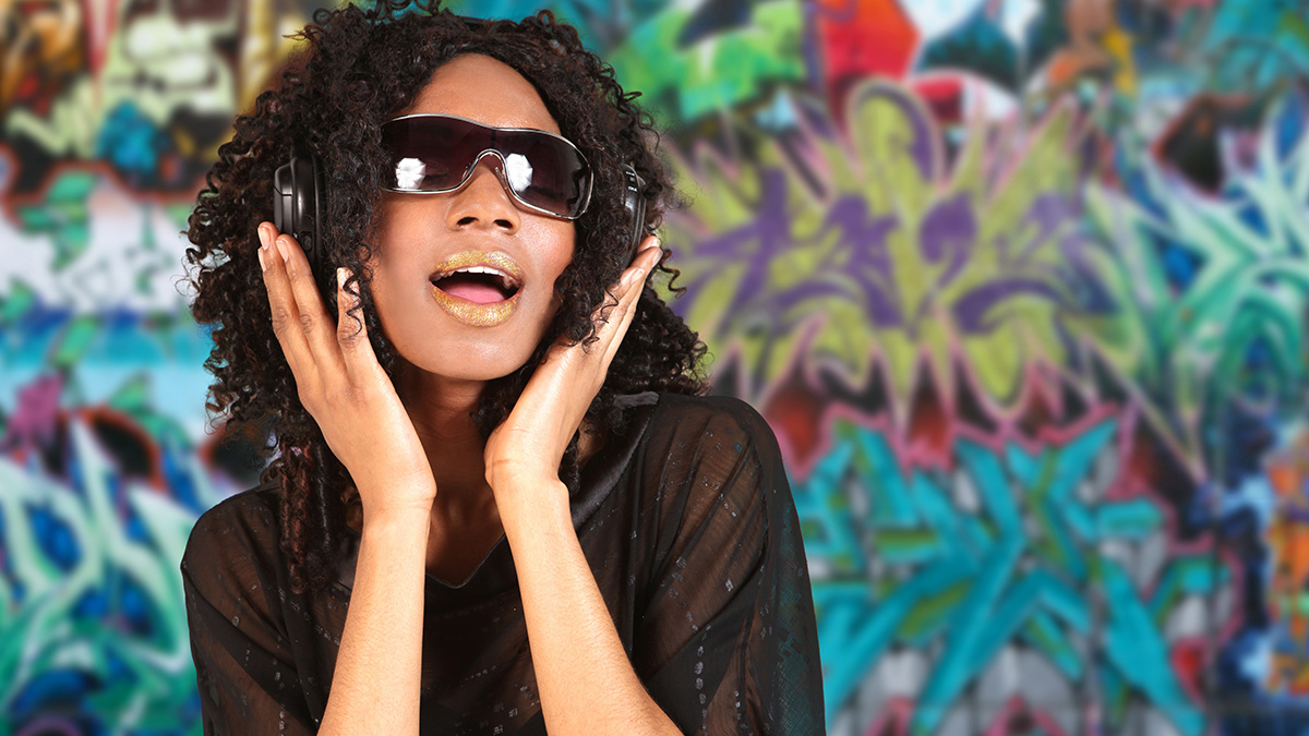 African woman listening to music
