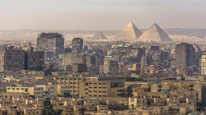 View of the Egyptian capital of Cairo with the Pyramids in the background