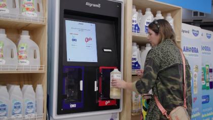 A customer uses an Algramo refilling station in a supermarket in Santiago, Chile.