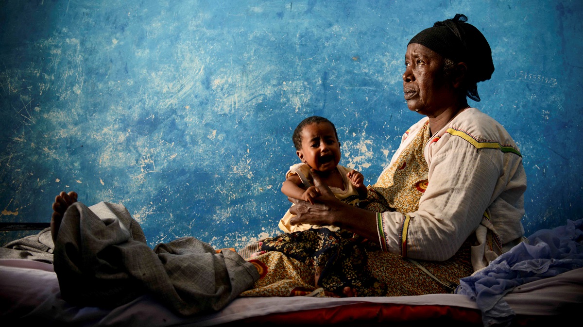 A woman and child in a health facility in Marka, Somolia